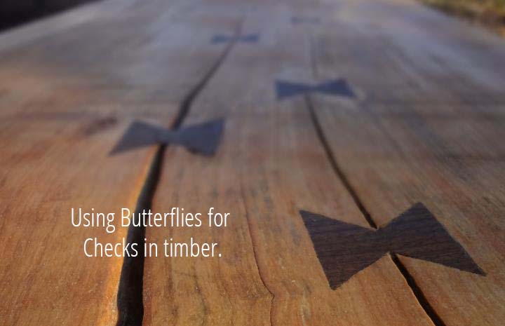 Image of Butterfy ties to hold wood checking