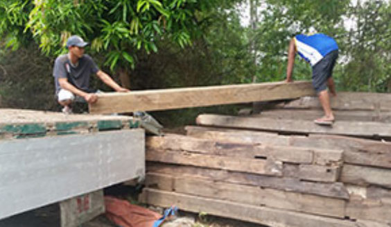 Picture of recycled timber being unload at Jarrah Works Fine Furniture