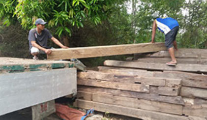 Picture of recycled timber being unload at Jarrah Works Fine Furniture