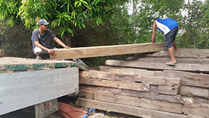 Picture of recycled timber being unload at Jarrah Works Fine Furniture